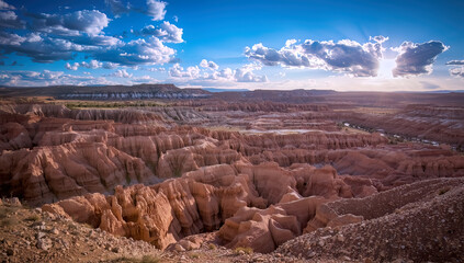 Badlands National Park, South Dakota, USA — Dramatic Badlands landscape with layered rock formations, eroded cliffs, rugged canyons, and wide open prairie