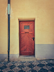 Historic ornate doorway with Latin inscription