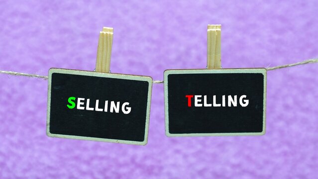 SELLING vs TELLING Concept.
