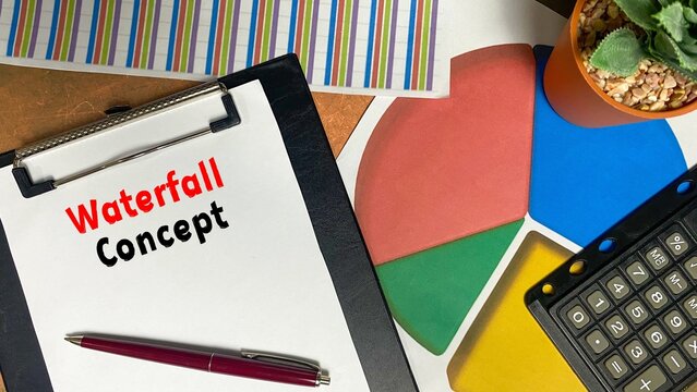Waterfall Concept written on a notebook isolated on a work desk.
