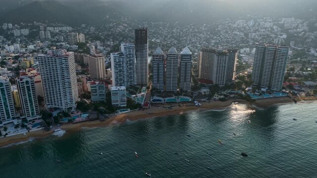 Cinematic aerial view of Acapulco Bay and its surrounding Pacific waters