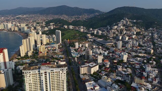 Cinematic aerial view of Acapulco Bay and its surrounding Pacific waters