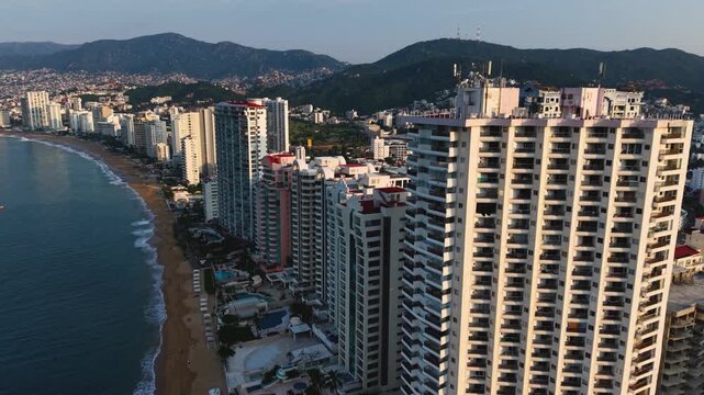 Cinematic aerial view of Acapulco Bay and its surrounding Pacific waters