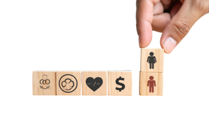 Hand stacks gender symbol block above a male symbol block; other blocks show symbols