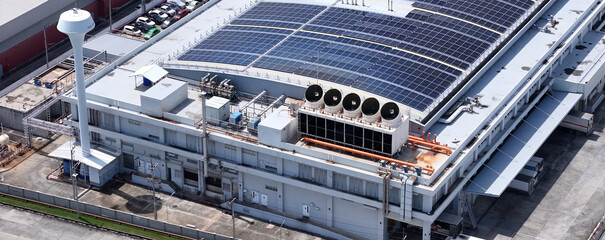 Cooling towers in data center building. Air conditioning cooling towers in front of building with...