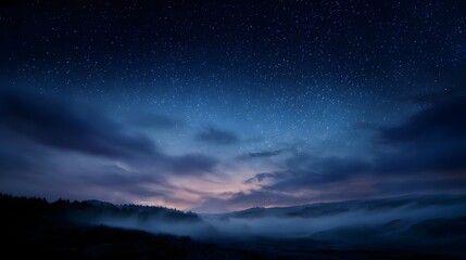 A serene starry night sky unfolds over misty rolling hills at twilight casting a gentle glow