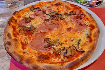 Pizza with ham and cheese