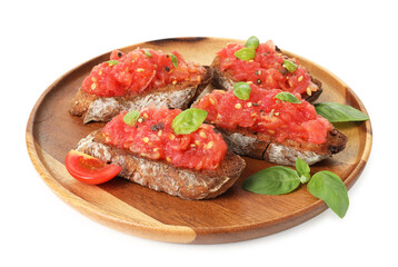 Tasty bruschettas with tomatoes and basil isolated on white