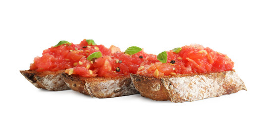 Tasty bruschettas with tomatoes and basil isolated on white