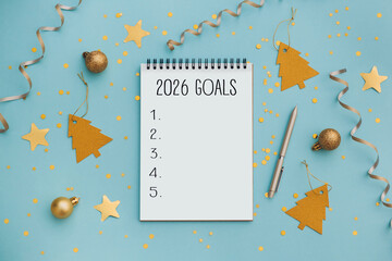 2026 goals list with festive decorations on blue background. Creative New Year planning and resolution, goals, action, checklist, expectations concept. New Year 2026 card