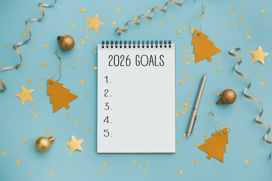 2026 goals list with festive decorations on blue background. Creative New Year planning and resolution, goals, action, checklist, expectations concept. New Year 2026 card