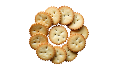 Round snack crackers in circular flower arrangement flat lay isolated on gray background