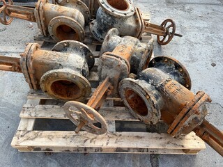 Old, rusty city water valves removed for replacement. Plumbing repair