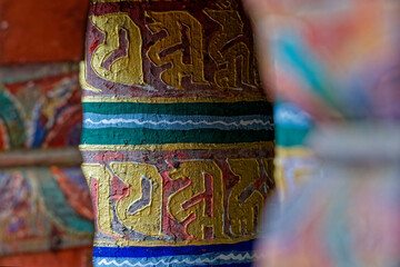 Painted prayer wheels close-up in Bhutan