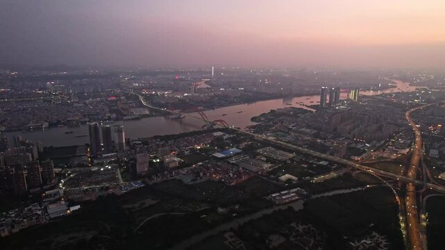 Guangzhou Haizhu District Aerial Sunset View with River and City Lights, Dajing Area China