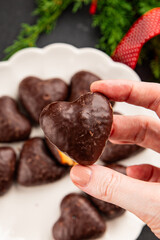 Gingerbread chocolate heart shaped honey cakes Christmas sweet dessert new year natural product tasty snack fresh delicious gourmet food background on the table rustic top view copy space