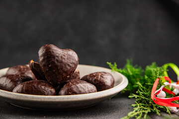 Gingerbread chocolate heart shaped honey cakes Christmas sweet dessert new year natural product tasty snack fresh delicious gourmet food background on the table rustic top view copy space