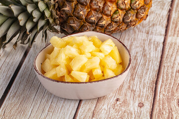 Sweet canned pineapple fruit pieces