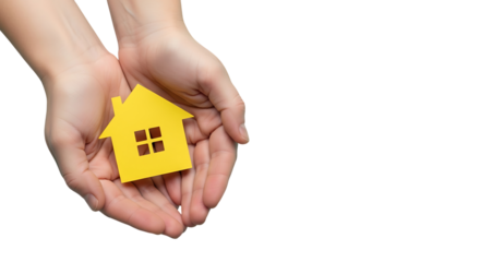 Hands holding a small yellow house cutout isolated on transparent background