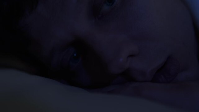 Man wakes up at night with rapid heartbeat, nighttime stress and physical anxiety