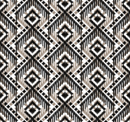 Seamless geometric ikat pattern. Hand draw abstract ethnic pattern design.
