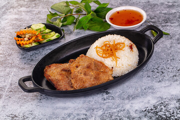 Roasted pork steak with rice