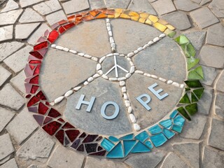 Obraz premium Colorful Circle of Broken Glass Symbolizing Hope