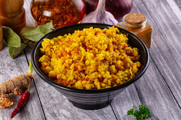 Indian yellow curry rice with tumeric