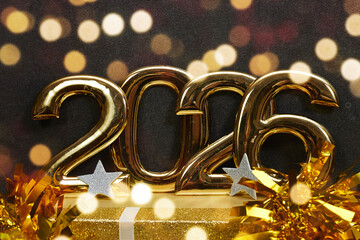 Golden 2026 Celebration With Glitter Gift Box, Bokeh Lights, And Festive Decor