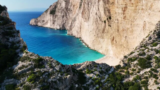 Aerial drone cinematic video of one of the most photographed beaches in the world called navagio or shipwreck a ship rest to rust ashore vanishing through the years, Zakinthos island, Ionian, Greece