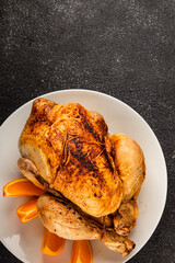 Baked chicken with oranges whole grilled chicken christmas holiday dish new year natural product tasty snack fresh delicious gourmet food background on the table rustic top view copy space