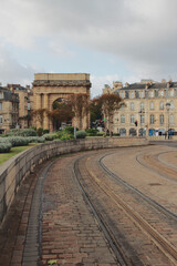 Tram tracks in cobblestone pavement. Bordeaux, France