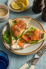 Salmon toasts with avocado, breakfast, healthy food