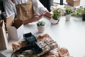 startup SME owner markets small plants for green living and environmental promotion