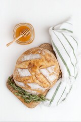 Sourdough bread loaf with honey and rosemary