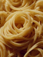 Uncooked tagliatelle pasta forming nests close-up view