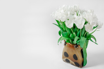 white tulips in vase