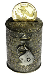 vintage coin bank with 1 ounce American gold eagle bullion coin isolated on white background