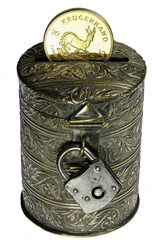 vintage coin bank with South African 1 ounce gold bullion coin isolated on white background
