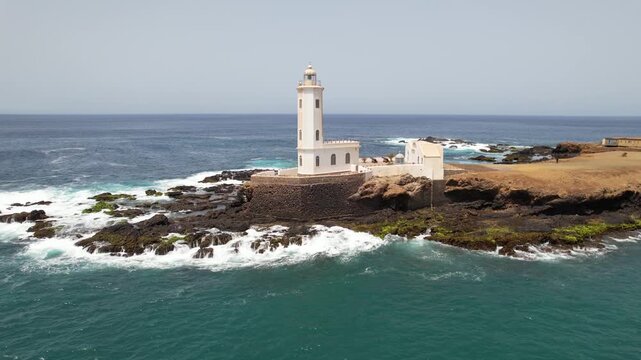 CAPE VERDE - 9.4.2025 - Stunning aerial footage circling the Farol Dona Maria Pia lighthouse on Cape Verde.