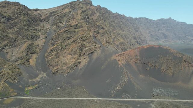 CAPE VERDE - 9.4.2025 - Stunning aerial view following a truck driving along a crater of the Pico do Fogo Volcano.