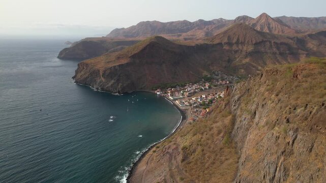 CAPE VERDE - 9.4.2025 - Amazing aerial footage approaching a remote village between cliffs on the coast of Santiago, Cape Verde.