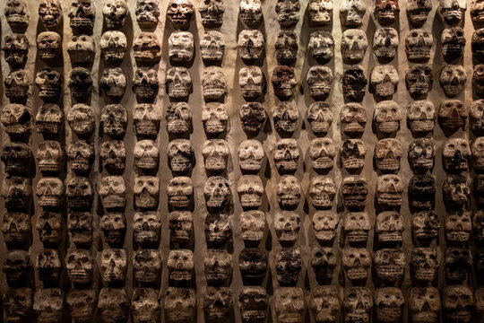 Skulls on a wall in Mexico City.