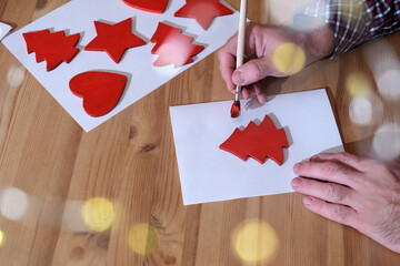 Painting christmas tree for holiday diy crafting. preparing for the new year