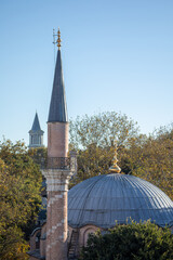 Historic Ottoman mosque minaret and dome in Istanbul