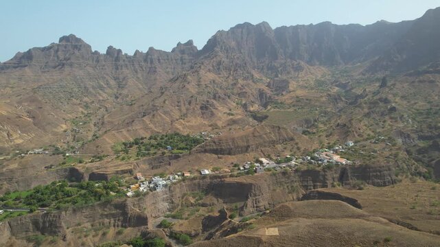 CAPE VERDE - 9.4.2025 - Excellent aerial footage approaching a village nestled in the mountains of Cape Verde's Santo Antao Island.