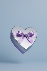 Heart-shaped silver gift box with lavender satin ribbon