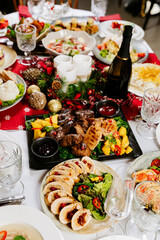 Festive Christmas dinner table with traditional holiday dishes and elegant table setting