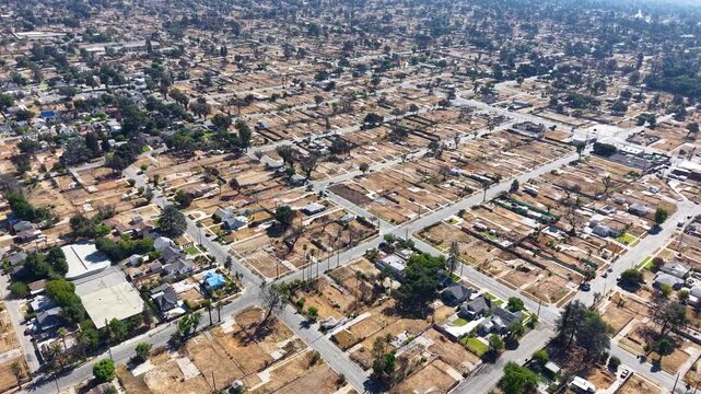LOS ANGELES - 9.10.2025 - Aerial footage passing over a neighborhood in Los Angeles where every home has been eradicated by the Eaton wildfires.