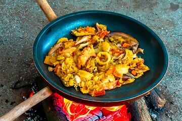 Traditional and Delicious Seafood Paella with Mussels, Shrimp, and Calamari	